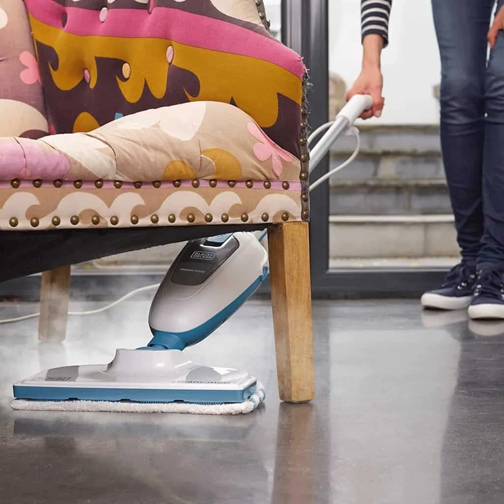 Steam mopping under a chair