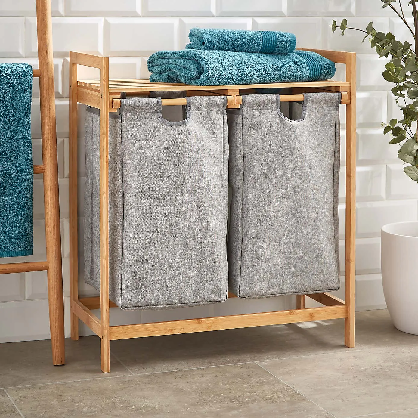 Bamboo frame laundry sorter with two grey fabric hampers