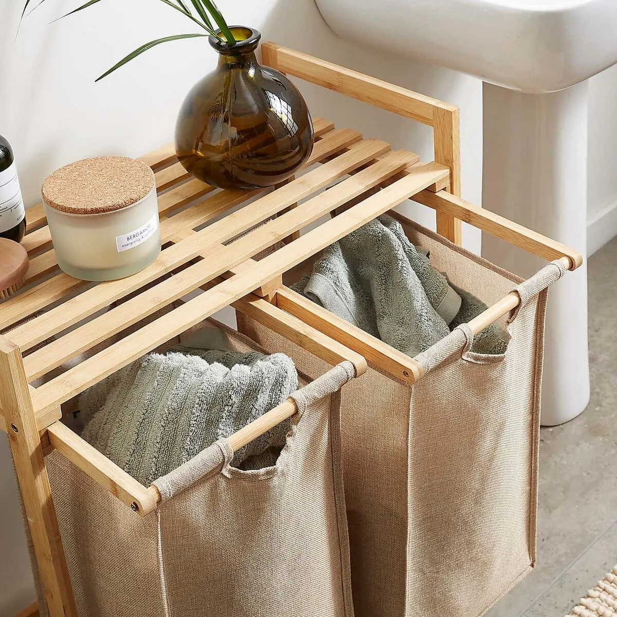 Bamboo frame laundry sorter with a pair of natural fabric hampers