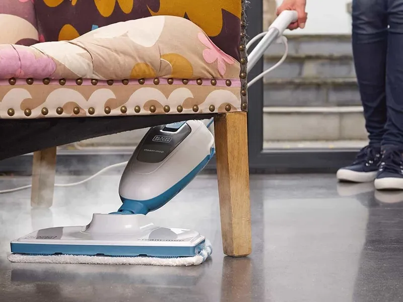 Cleaning floor with a steam mop