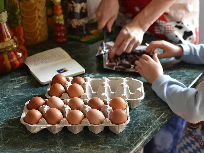 Child baking with grandma