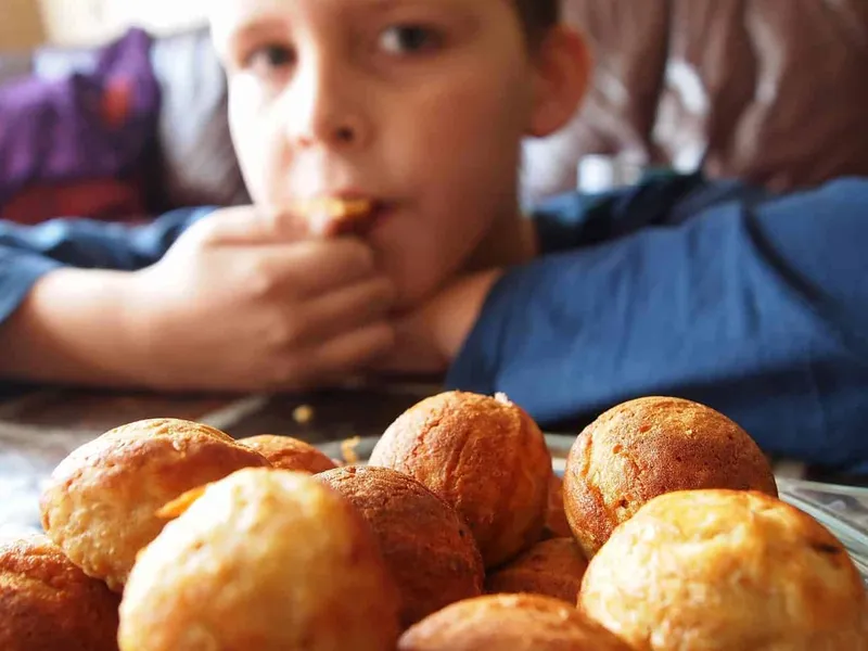 Boy eating bread