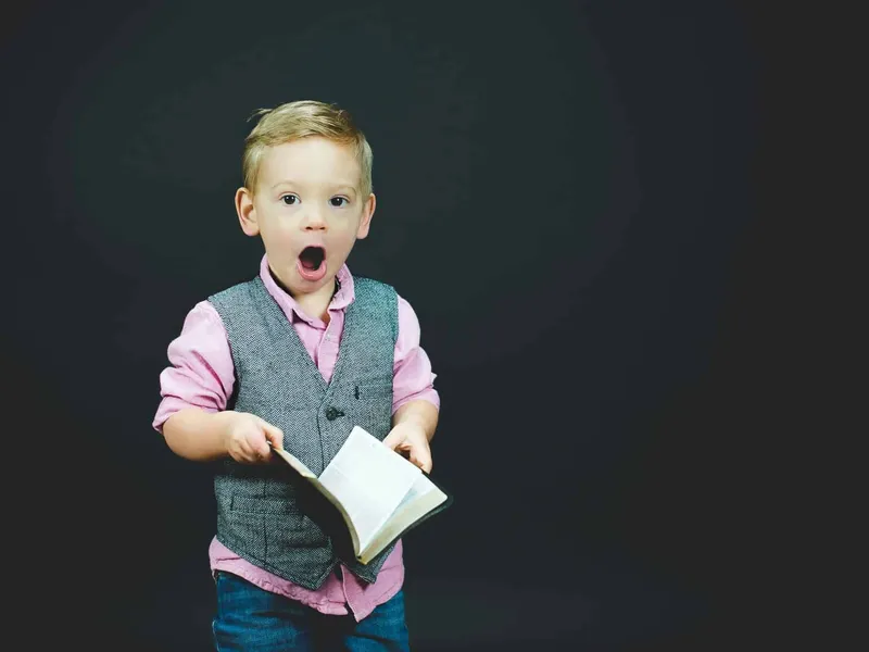 Boy reading aloud