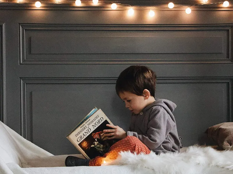 Boy reading a book