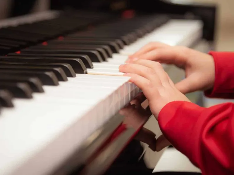 Child playing the piano