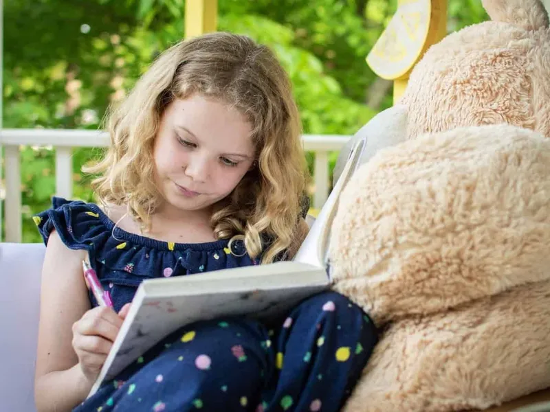 Child writing a diary