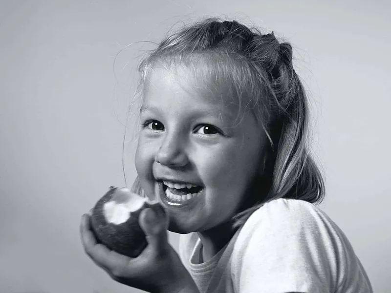 Girl eating an apple