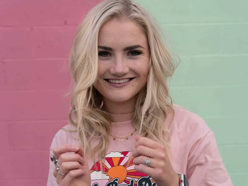 Teenage girl wearing a pink top