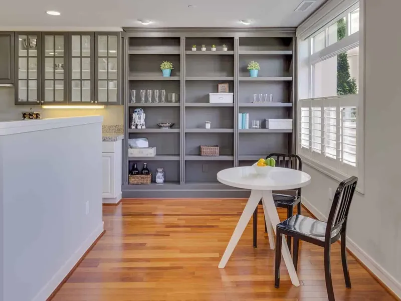 Grey-painted kitchen shelving