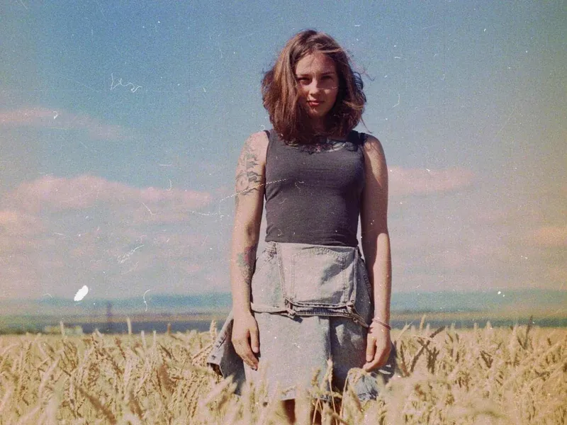 Teen with tattoos