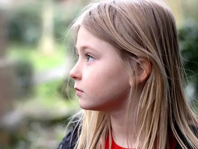 Young girl looking nervous